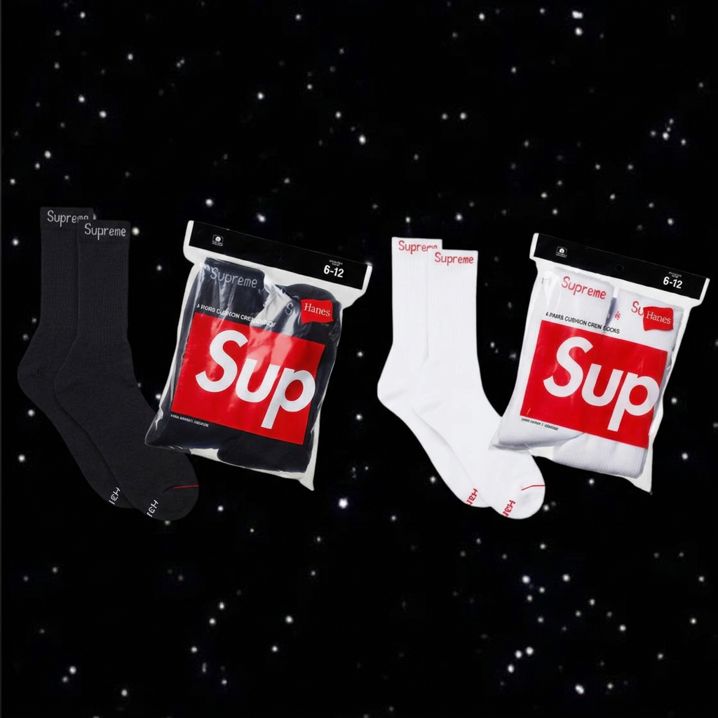 Black and white Supreme socks with packaging on a black starry background